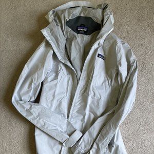 white patagonia raincoat